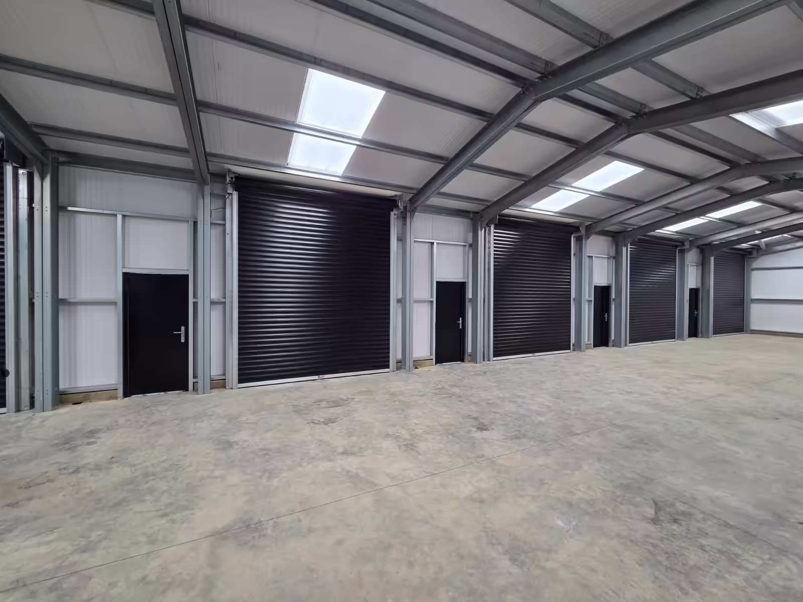 Galvanised steel roller shutter supplied to a commercial unit in Birmingham